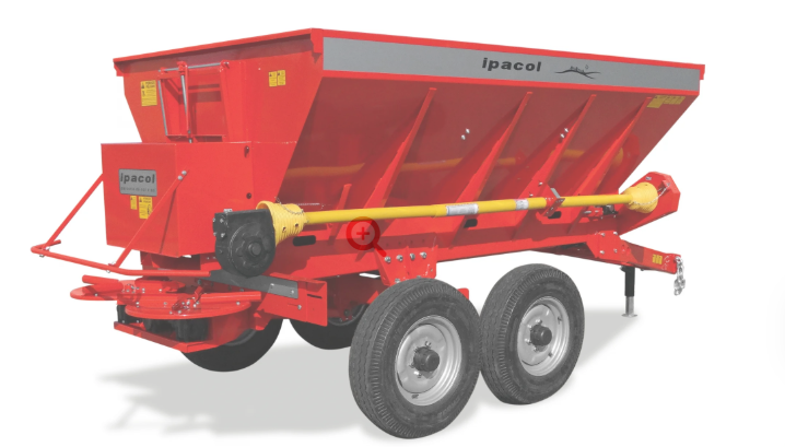 Distribuidor de adubos, calcário e adubos orgânicos Ipacol DSE com esteira transportadora e rodado duplo tandem.